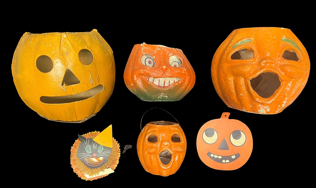 Four antique moulded pulp paper mache jack-o-lantern lanterns and two embossed die-cut Halloween decorations