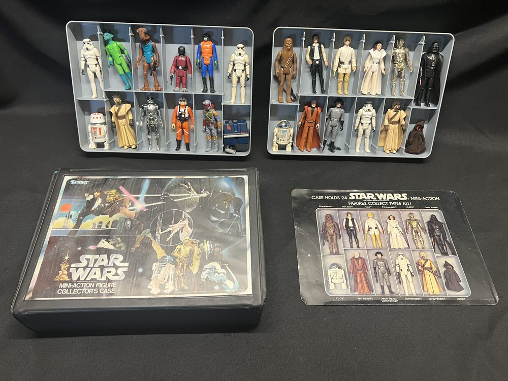 Kenner Star Wars plastic action figure collection with two display cases, circa 1977-1980