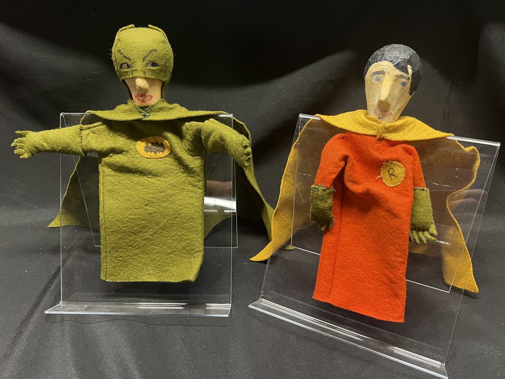 Handmade cardboard, papier mache and felt Batman and Robin hand puppets, circa 1950s-1960s